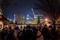 LONDON, ENGLAND, DECEMBER 28, 2018: People enjoying a pleasant time in a Christmas market, surrounded by food and drink stands,