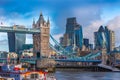 London, England - The famous Tower Bridge with iconic red double-decker buses Royalty Free Stock Photo