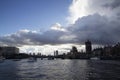 Dark skies over Westminster Bridge seen from the River Thames, London, England, February 12, Royalty Free Stock Photo
