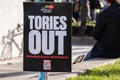 LONDON, ENGLAND- 12 February 2022: TORIES OUT placard at a Cost of Living protest in London
