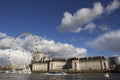 View of London Eye Millennium Wheel on the South Bank of river Thames in front of City Hall, Royalty Free Stock Photo