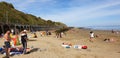 London, England, Folkestone, kent: June 1st 2019:Tourists on Sunny sands beach enjoying the beautiful sunshine and blue sky on the