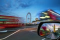 London, England - iconic red double-decker buses on the move on Westminster Bridge with Big Ben Royalty Free Stock Photo