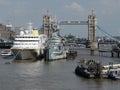 England Ã¢â¬â London Ã¢â¬â HMS Belfast and A Cruise Ship - Tower Bridge in the Background Royalty Free Stock Photo