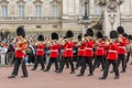 LONDON, ENGLAND - JUNE 17 2016: British Royal guards perform the Changing of the Guard in Buckingham Palace, London, Grea Royalty Free Stock Photo