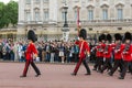 LONDON, ENGLAND - JUNE 17 2016: British Royal guards perform the Changing of the Guard in Buckingham Palace, London, Grea Royalty Free Stock Photo