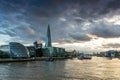 LONDON, ENGLAND - JUNE 15 2016: Sunset photo of The Shard skyscraper and City Hall from Thames river, Great Britain