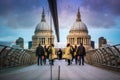 London, England - Londoners walking through Millennium Bridge. Reflecting St.Paul`s Cathedral Royalty Free Stock Photo