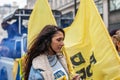 LONDON, ENGLAND- 13 March 2022: Reveller at a Dance For Peace Parade to fundraise for Red Cross and Disasters Emergency Committee