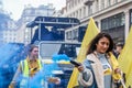 LONDON, ENGLAND- 13 March 2022: Revellers at a Dance For Peace Parade to fundraise for Red Cross and Disasters Emergency Committee