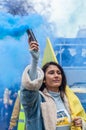 LONDON, ENGLAND- 13 March 2022: Revellers at a Dance For Peace Parade to fundraise for Red Cross and Disasters Emergency Committee