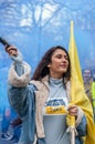 LONDON, ENGLAND- 13 March 2022: Revellers at a Dance For Peace Parade to fundraise for Red Cross and Disasters Emergency Committee