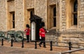 Guards changing ceremony in the historic Tower of London where Royal jewelry collection held.