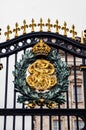 LONDON, ENGLAND Royal coat of arms of the United Kingdom on the Buckingham palace gate Royalty Free Stock Photo