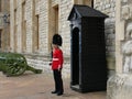 Soldier of Royal Guard of London. Soldier of English Guard patrols inside Tower of London in Royalty Free Stock Photo