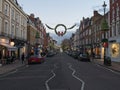 St John`s Wood Hight Street with Christmas decoration in the evening. Royalty Free Stock Photo