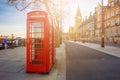 London, England - Traditional Old British red telephone box at Victoria Embankment with Big Ben Royalty Free Stock Photo