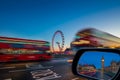 London, England - Traditional red double decker buses on the move on Westminster Bridge with Big Ben and Houses of Parliament Royalty Free Stock Photo