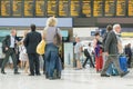 London, England, UK - 31 August 2016: Woman checks the train departure boards