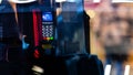 London, England, UK - December 31, 2019: An abstract view through a taxi window to a bank terminal for payment for a London taxi