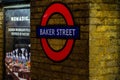 London, England, UK - December 31, 2019:  Baker Street sign on the brick wall. It is the famous iconic of underground station in Royalty Free Stock Photo