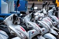 London, England, UK - December 31, 2019: Row of scooters of Domino Pizza restaurant