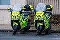 London, England, UK - December 31, 2019: Two London Metropolitan police motorbikes parked in a line on the side of the street Royalty Free Stock Photo