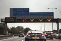 Cars driving on highway in England.