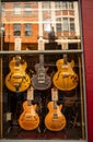 Upscale guitar shops on Denmark Street in London offering guitars and repair services in London