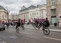 LONDON, ENGLAND - 08/21/2019: Young people riding bikes doing the rocking horse on Regent Street, near Piccadilly Circus