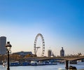 London eye across the river thames and lamppost Royalty Free Stock Photo