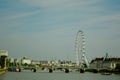 London, UK, July 2019. View at the South Bank of the River Thames in London, with London Eye as the central element of the citysca Royalty Free Stock Photo