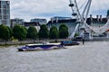 The London eye by the thames river