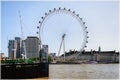 London Eye, a giant Ferris Wheel on the embankment of river Thames, London