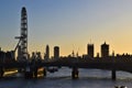 London Eye and Houses of Parliament silhouette at dusk Royalty Free Stock Photo