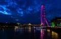 The London Eye reflected in the Thames