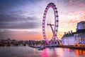 The London Eye on the South Bank of the River Thames at night, United Kingdom capital city, London Royalty Free Stock Photo