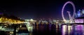 A panorama of he London eye at night Royalty Free Stock Photo