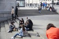 Girls have lunch on the steps near the National Gallery on Trafalgar Square Royalty Free Stock Photo