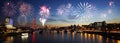 London skyline, night view, fireworks over Hungerford Bridge and Royalty Free Stock Photo