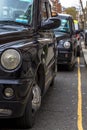 London, Great Britain. April 12, 2019. Kensington street. Cab parking. London cab is considered the best taxi in the Royalty Free Stock Photo