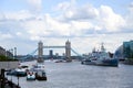 London, Great Britain -May 23, 2016: Pleasure boats, Belfast Museum Ship on the River Thames near Tower Bridge