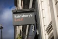 London, Greater London, United Kingdom, 7th February 2018, A sign and logo for Sainsburys local