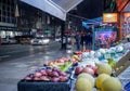 London high street grocery store with bypassers