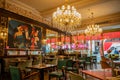 London: Inside upscale Cafe Concerto in Covent Garden with beautiful chandeliers and paintings