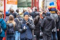 London, January 26, 2020. Photographer taking photos in London Chinatown. Chinese New Year Celebrations. Selective focus