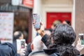 London, January 26, 2020. Spectators taking pictures with cell phones during Chinese New Year Celebrations Royalty Free Stock Photo