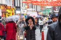 London, January 26, 2020. Spectators taking pictures with cell phones during Chinese New Year Celebrations