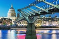 LONDON - JUNE 15, 2015: City night skyline with St Paul Cathedral and Millennium Bridge. London attracts 50 million people annual