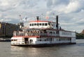 LONDON - JUNE 25 : The Dixie Queen cruising along the River Thames in London on June 25, 2014. Unidentified people. Royalty Free Stock Photo